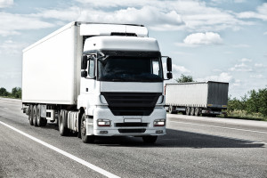 White truck on road. Cargo transportation